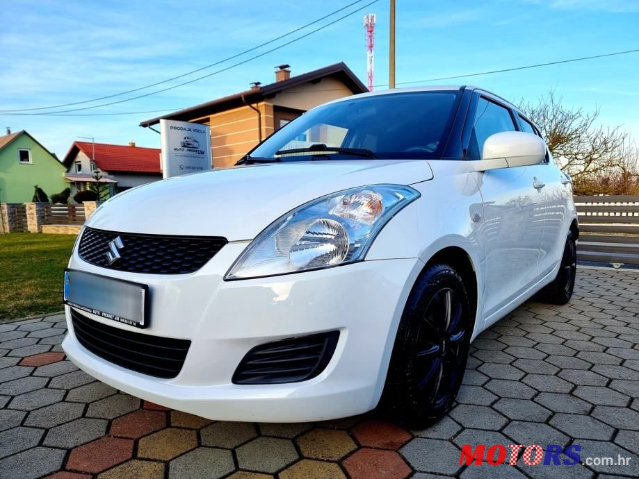 2013' Suzuki Swift 1,2 Se Ac photo #1