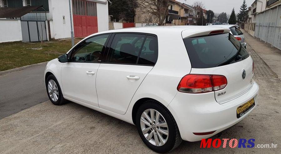 2011' Volkswagen Golf VI 1,6 Tdi photo #2