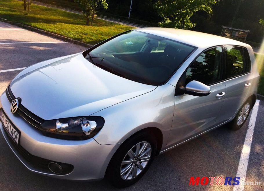 2012' Volkswagen Golf VI 1,6 Tdi photo #1