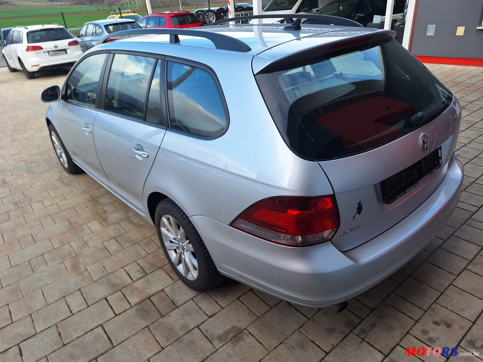 2011' Volkswagen Golf VI Variant photo #3