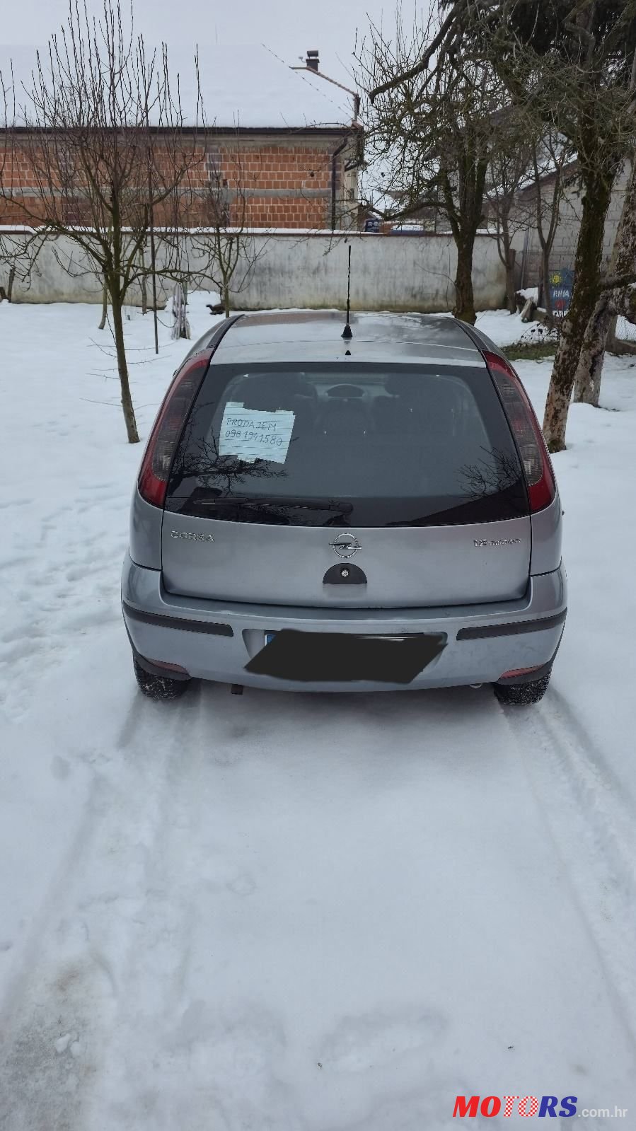 2005' Opel Corsa 1,2 16V photo #3