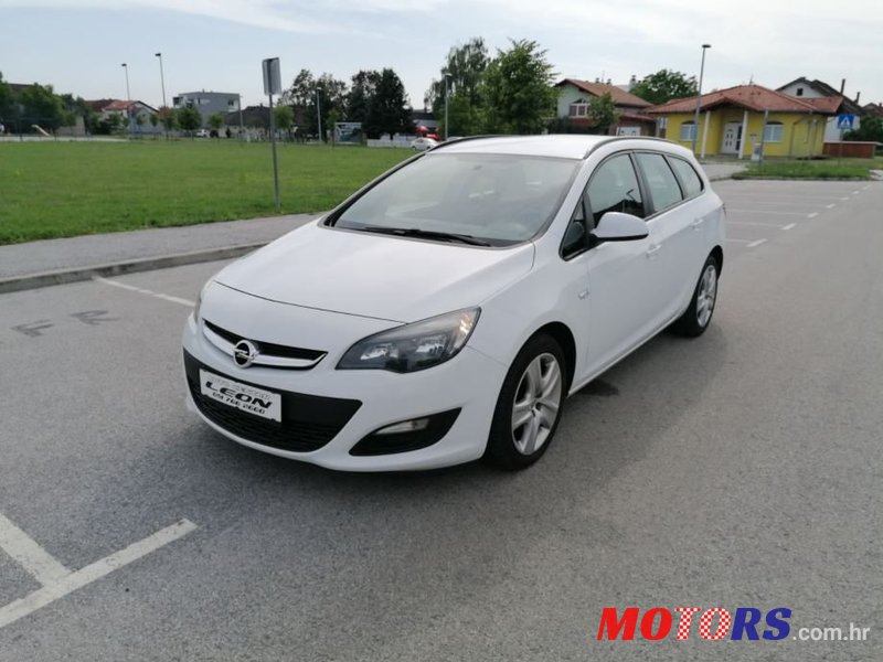 2013' Opel Astra Karavan photo #1