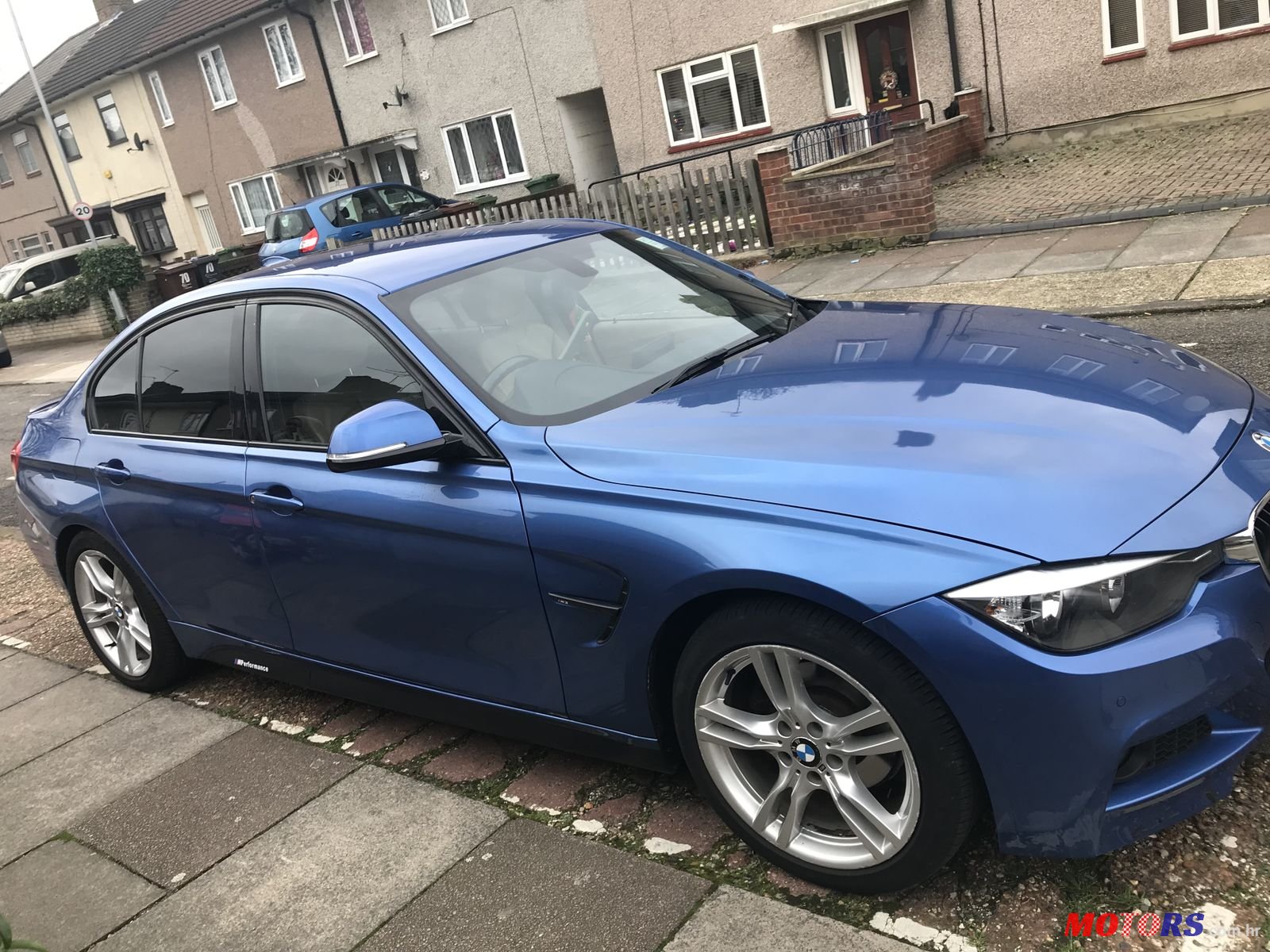 2012' BMW 3 Series M Sport with M3 wings photo #2
