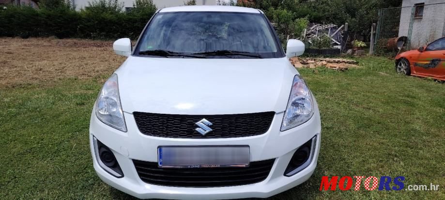 2013' Suzuki Swift 1,3 photo #2