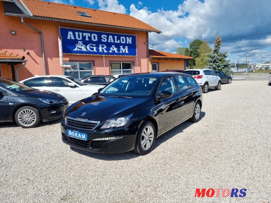 2015' Peugeot 308 Sw photo #1