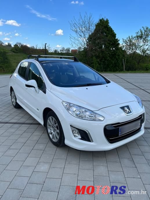 2012' Peugeot 308 photo #1