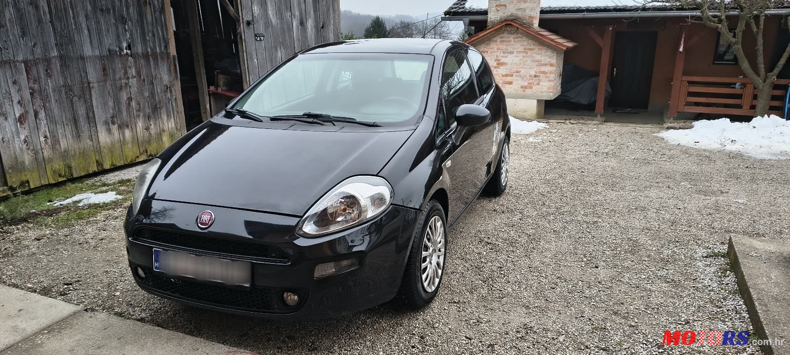 2015' Fiat Punto Evo 1.3 Jtd photo #1