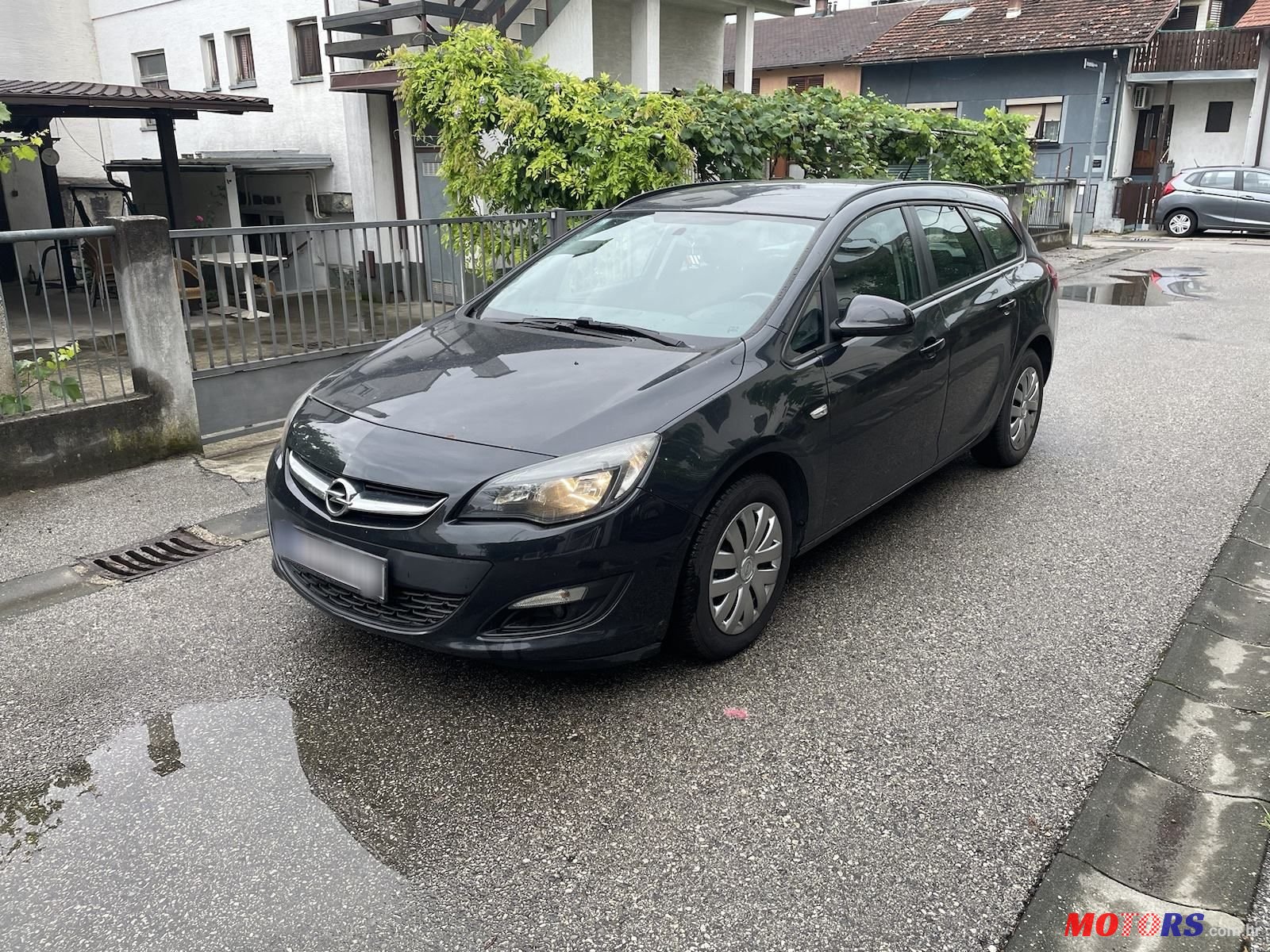 2014' Opel Astra Karavan photo #1