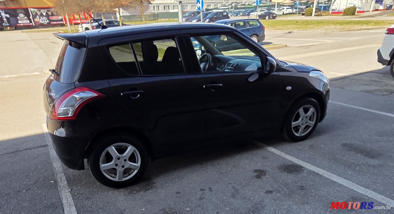 2013' Suzuki Swift 1,2 Se photo #1