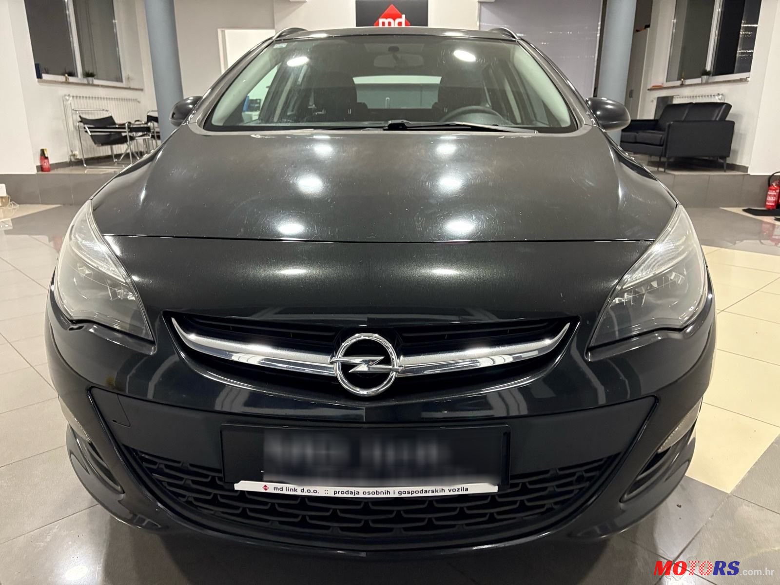 2013' Opel Astra Karavan photo #2