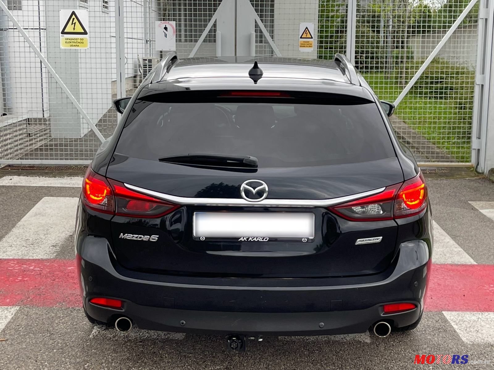 2015' Mazda 6 Sport Combi photo #5