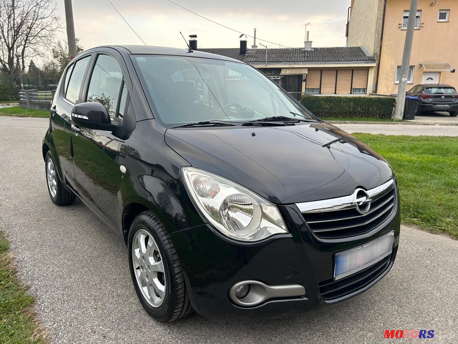 2009' Opel Agila 1,3 photo #5
