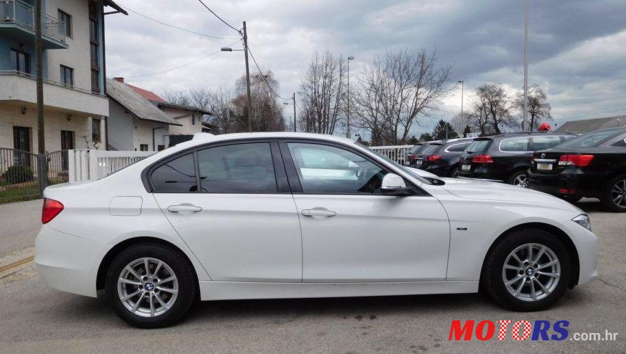 2014' BMW Serija 3 318D photo #2