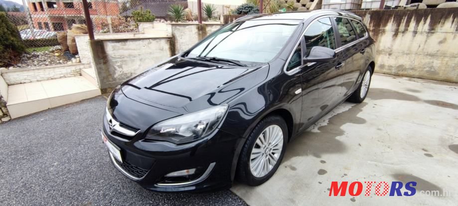 2014' Opel Astra Karavan photo #2