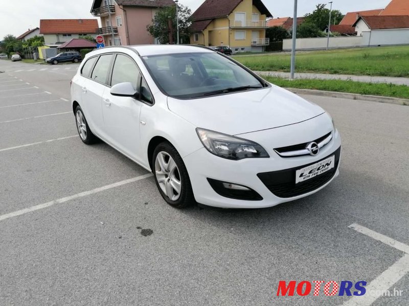 2013' Opel Astra Karavan photo #2