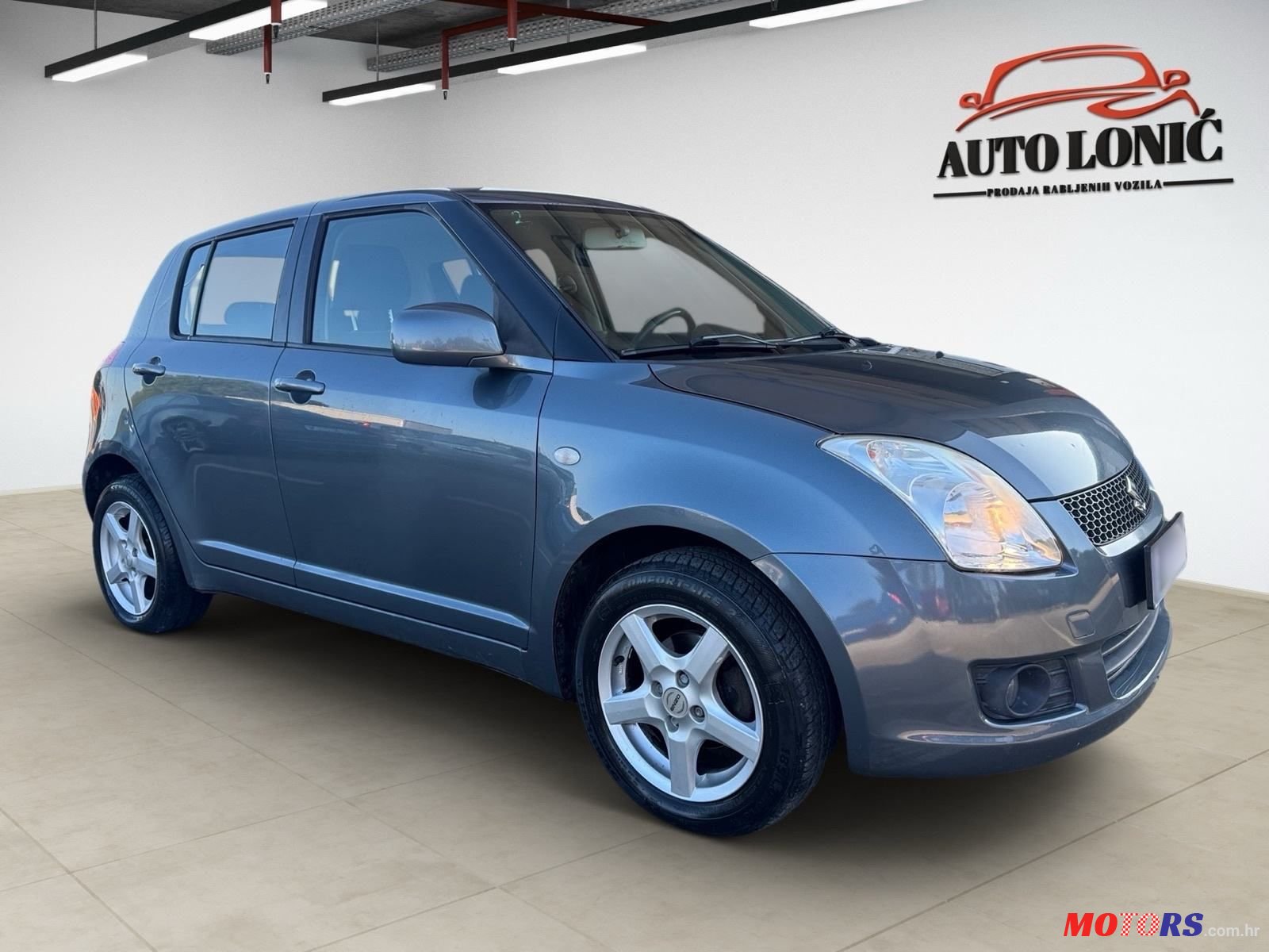 2009' Suzuki Swift 1,3 Gs photo #4