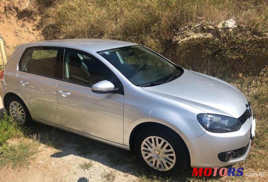 2011' Volkswagen Golf VI 1,6 Tdi photo #1