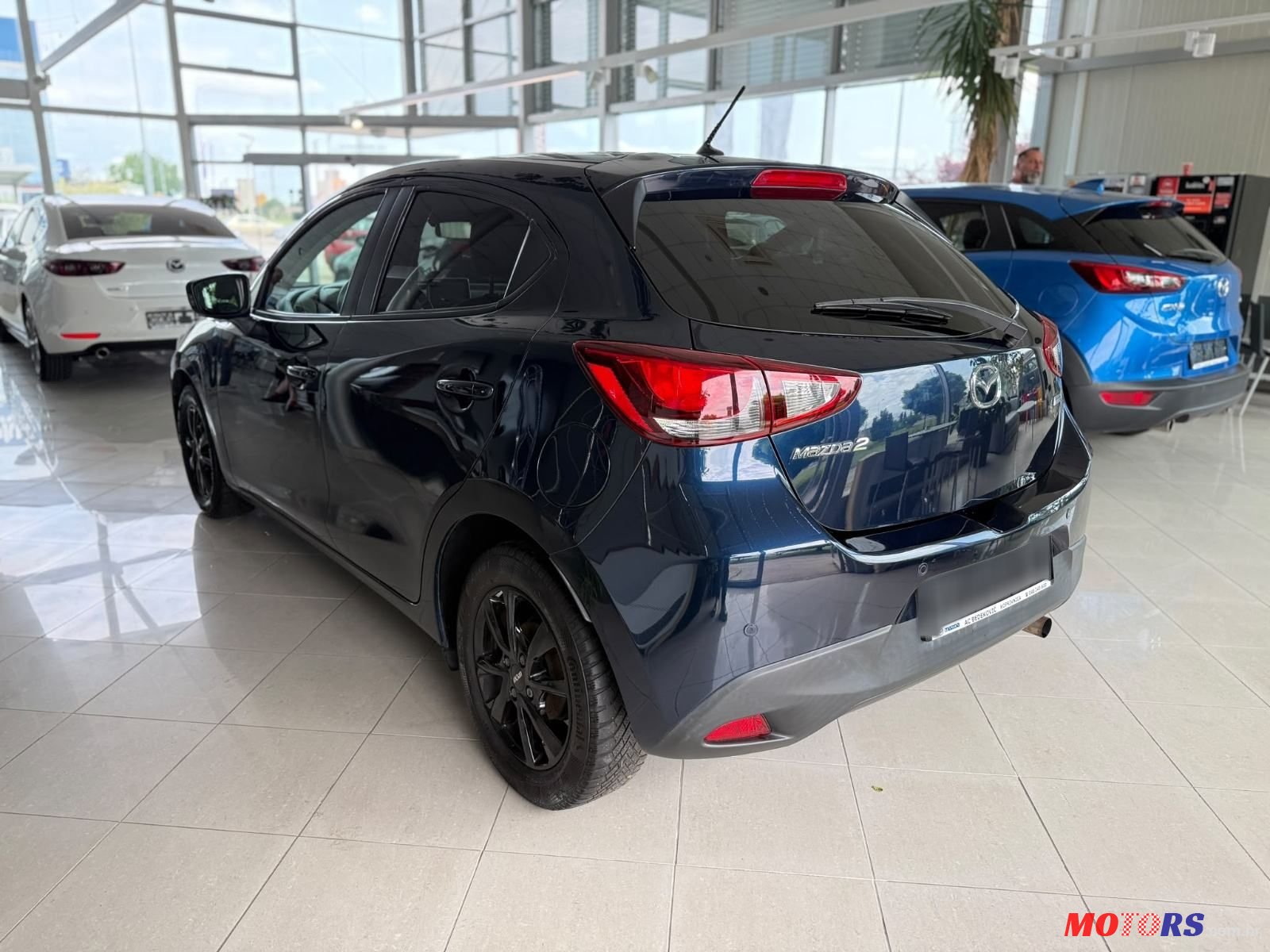2016' Mazda 2 G90 photo #5