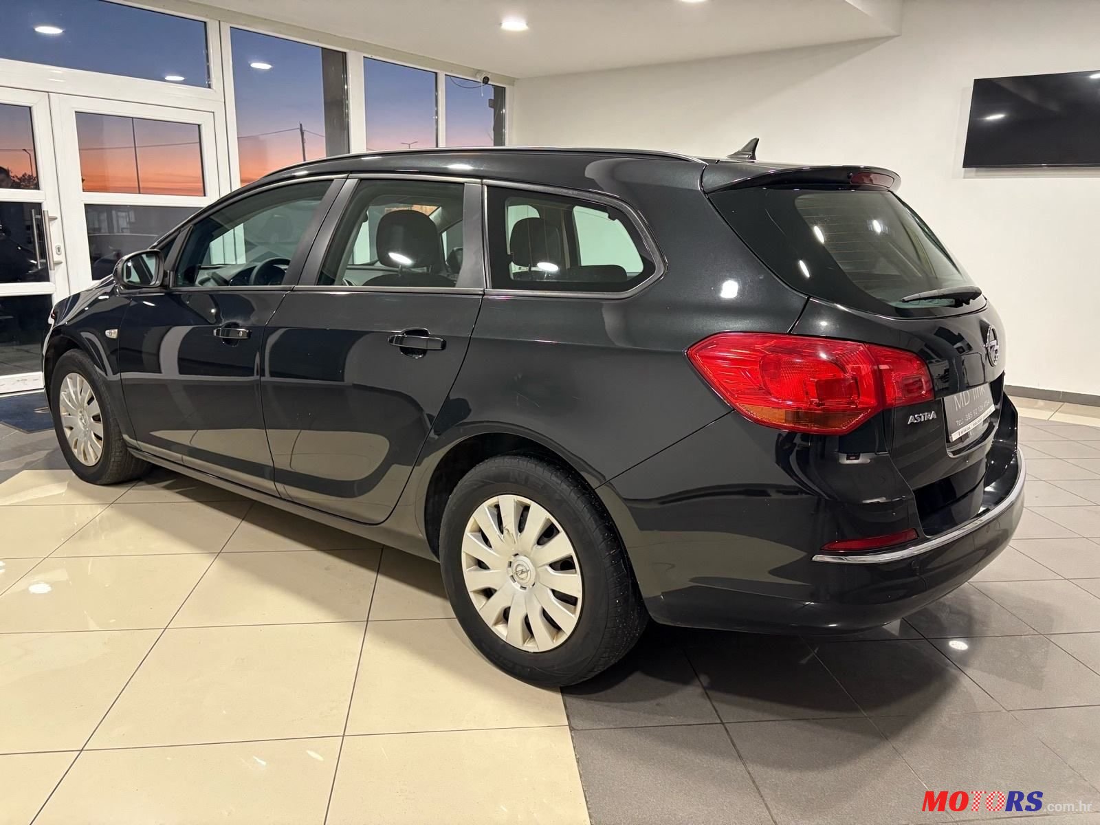 2013' Opel Astra Karavan photo #4