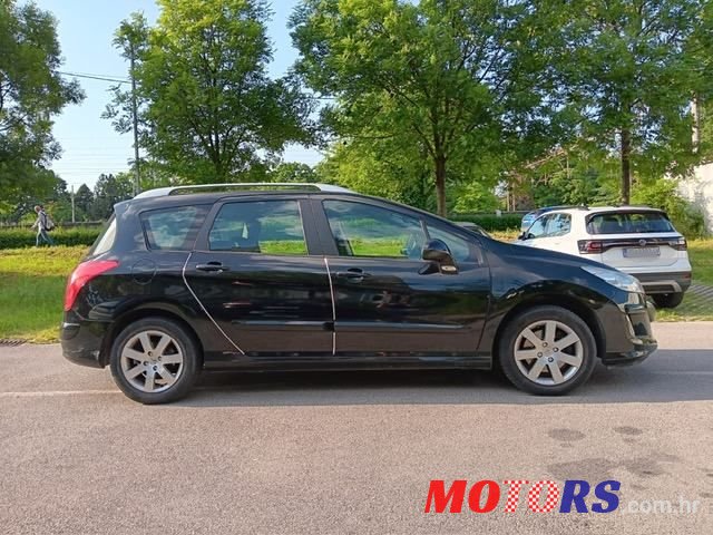 2009' Peugeot 308 Sw photo #1