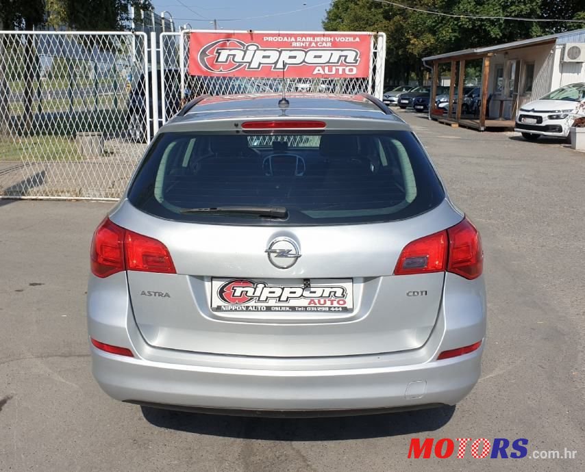 2012' Opel Astra Karavan photo #5
