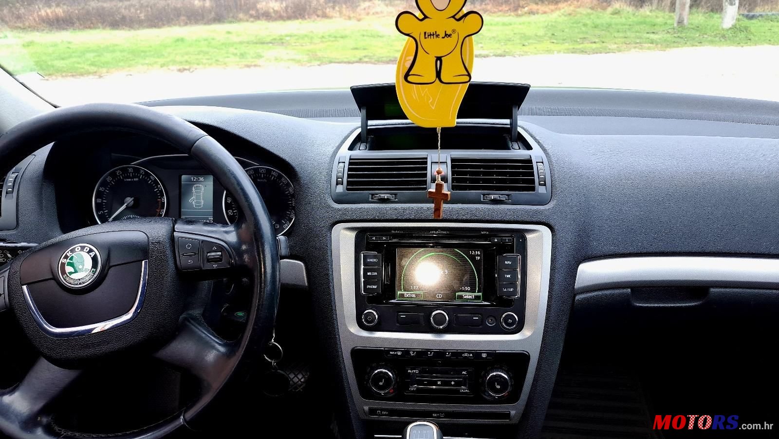 2011' Skoda Octavia 1,6 Tdi photo #6