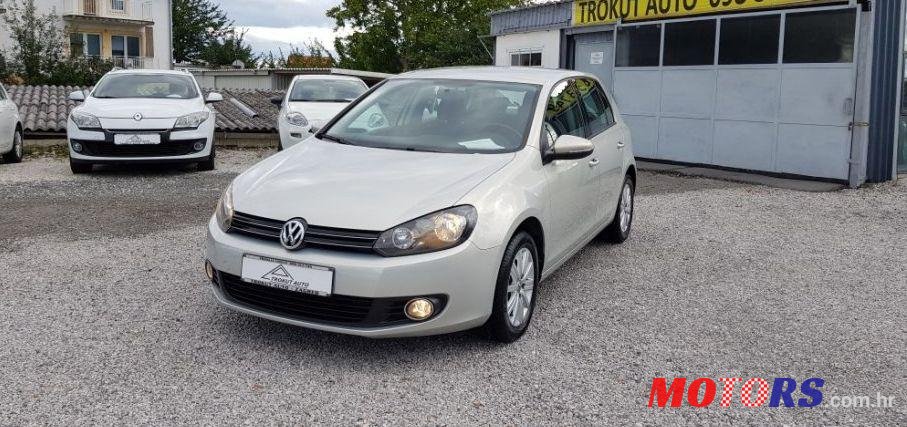 2011' Volkswagen Golf VI 1,6 Tdi photo #1