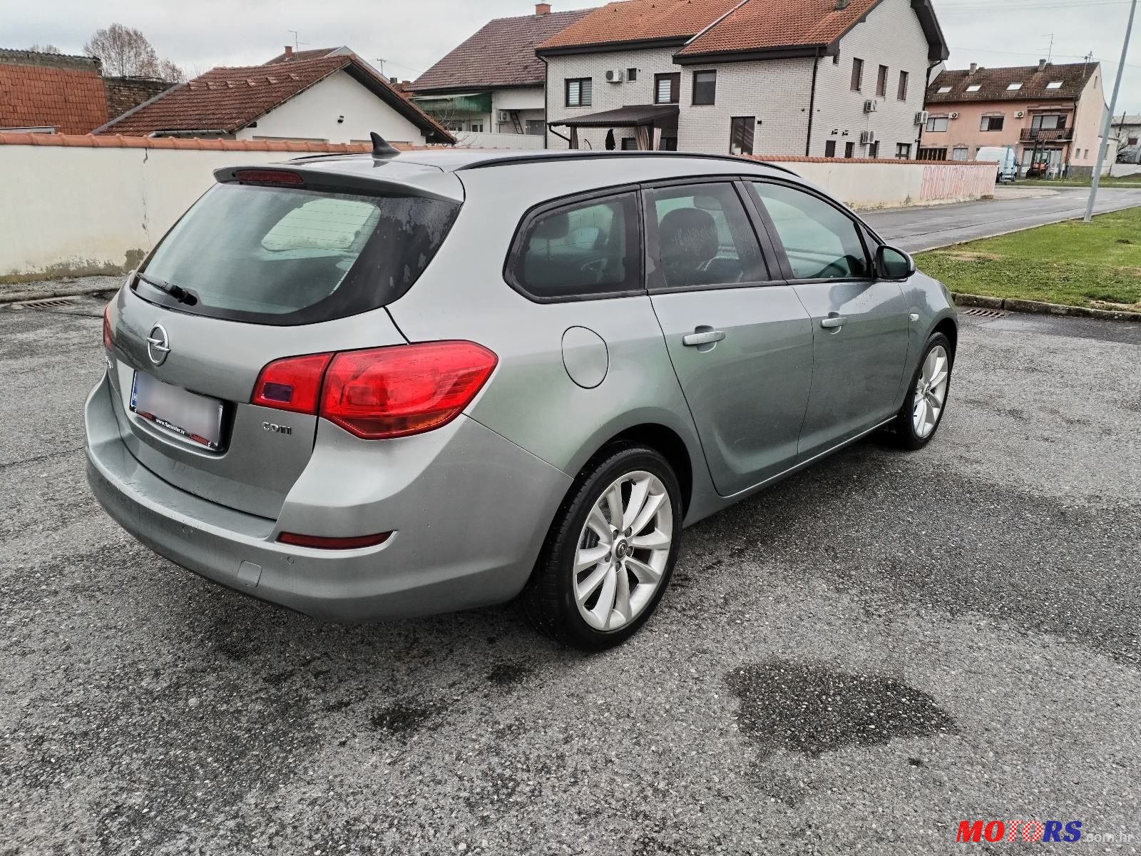 2013' Opel Astra Karavan photo #3