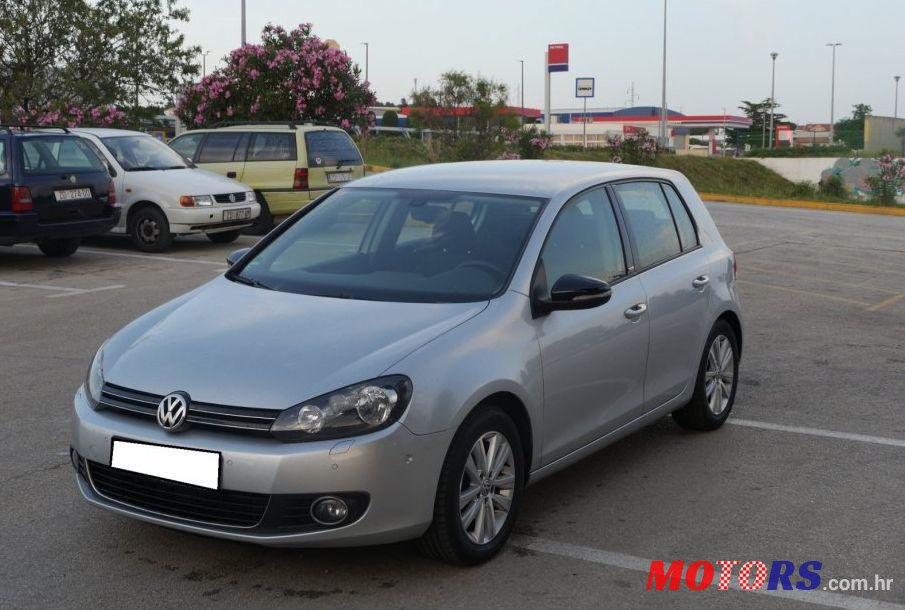 2011' Volkswagen Golf VI 1,6 Tdi photo #1