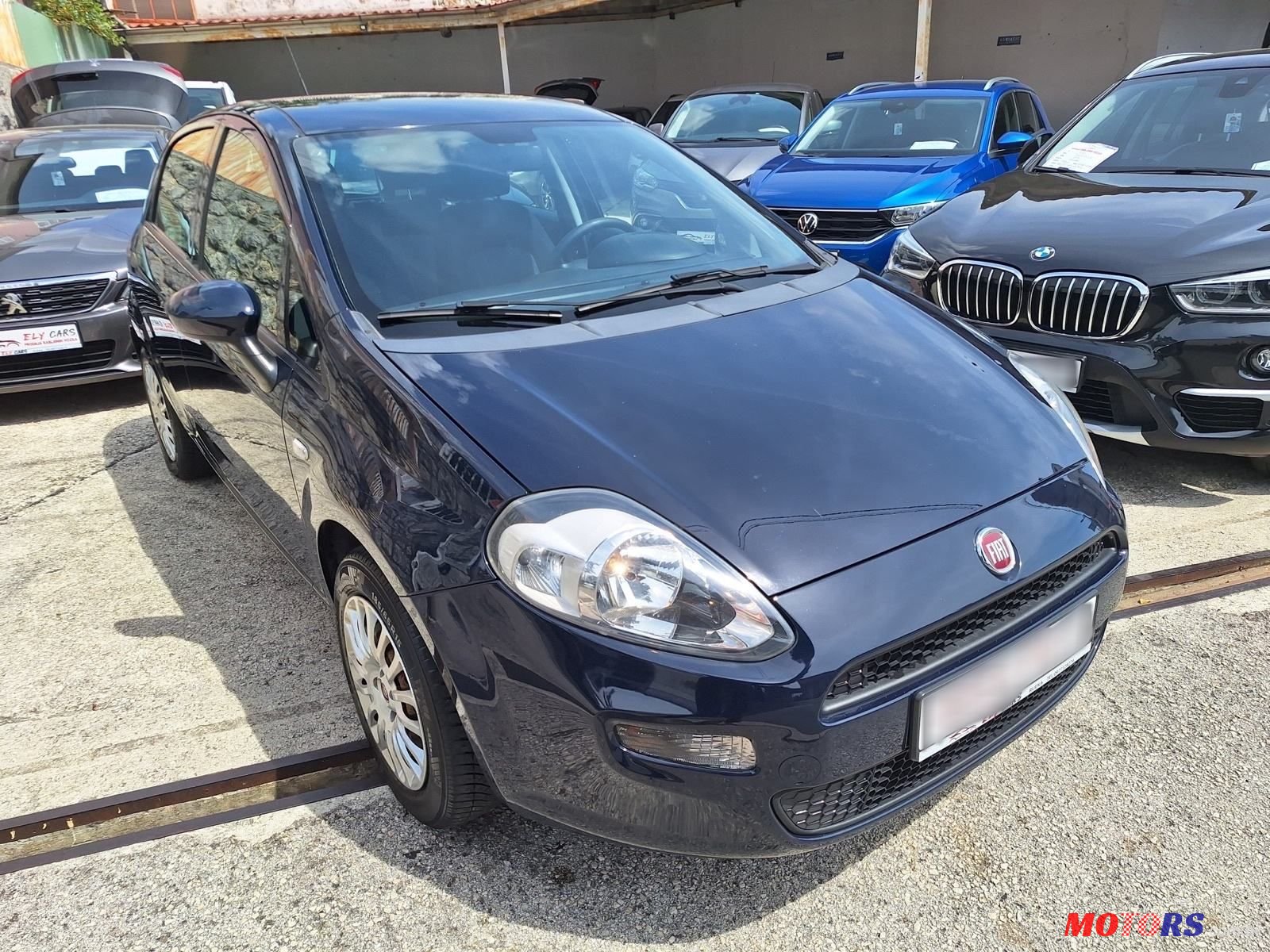 2015' Fiat Punto Evo 1.4 photo #2