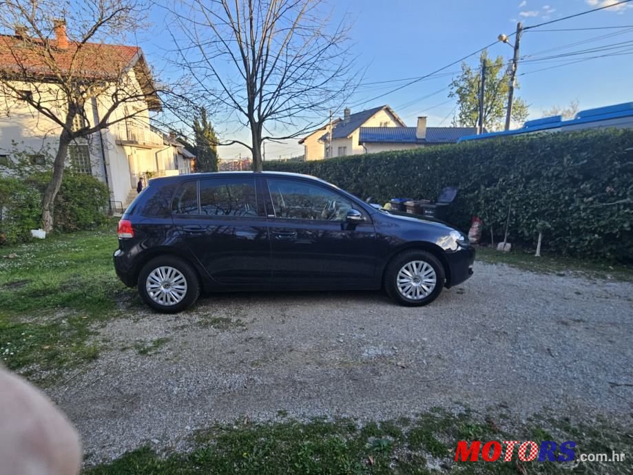 2012' Volkswagen Golf VI 1,6 Tdi photo #3