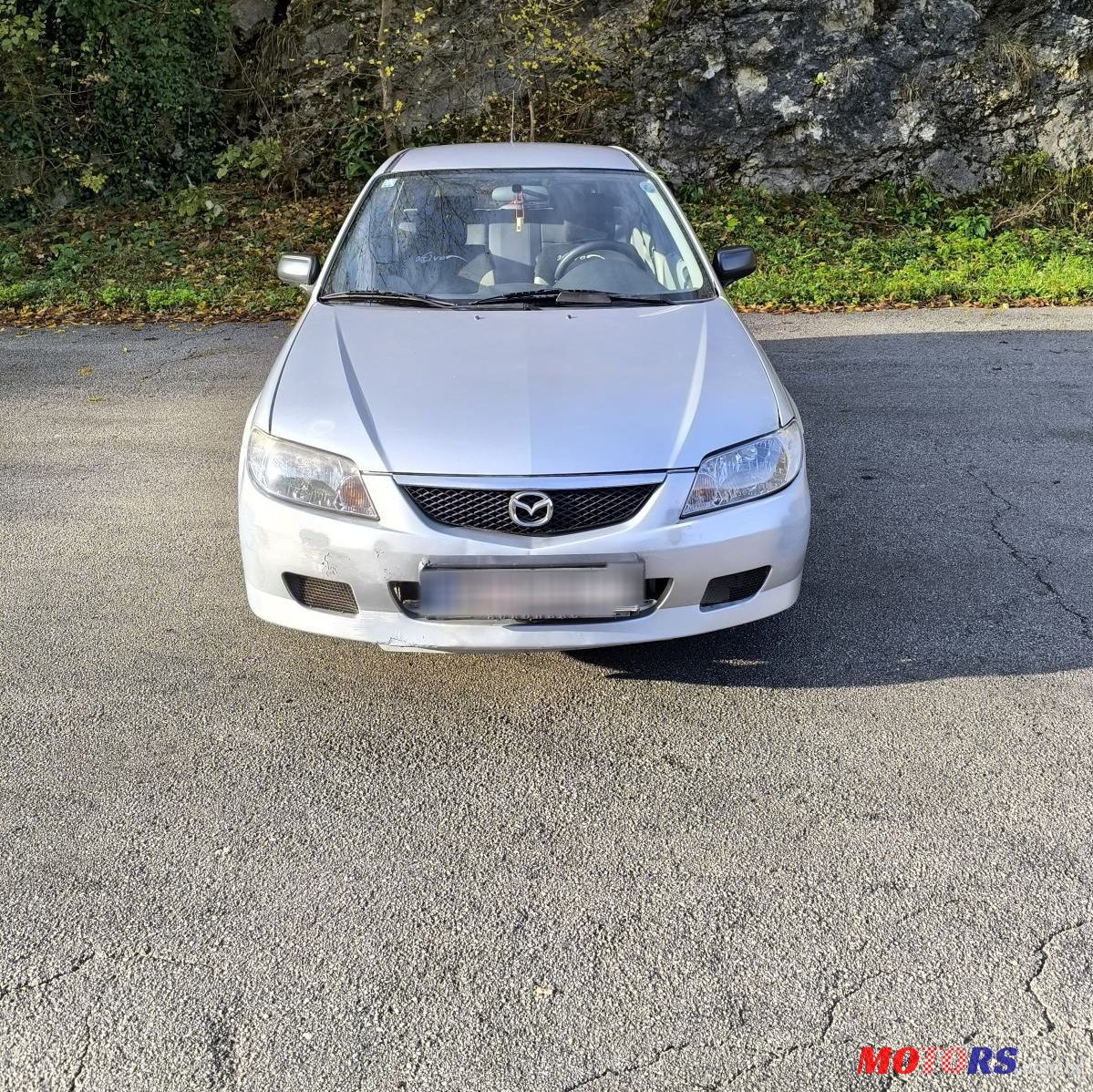 2003' Mazda 323 F 1,3 I photo #1