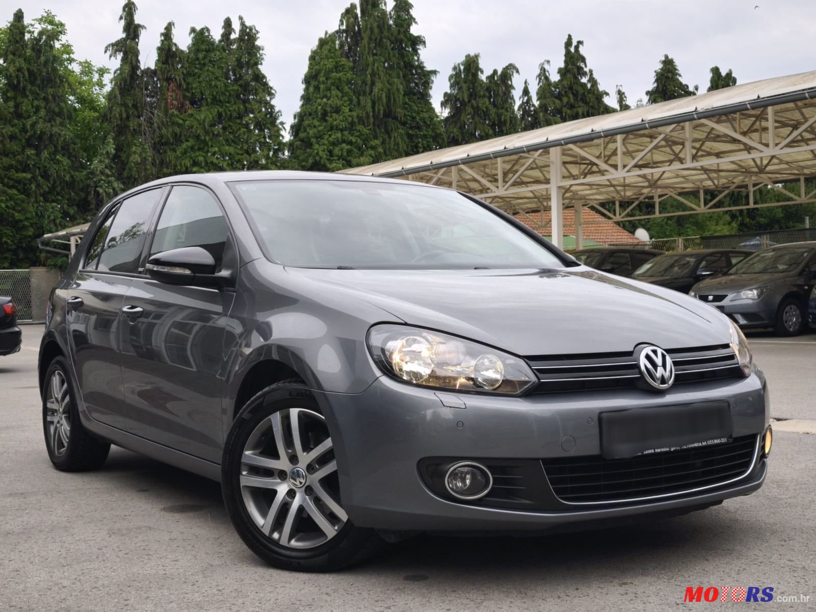 2012' Volkswagen Golf VI 1,6 Tdi photo #1