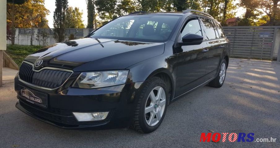 2014' Skoda Octavia Combi 1,6 Tdi photo #1