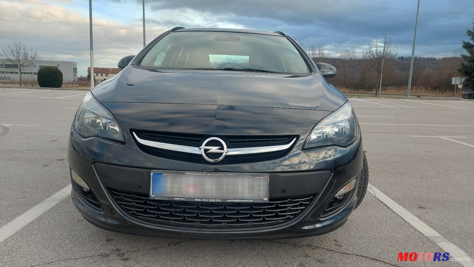 2014' Opel Astra Karavan photo #2