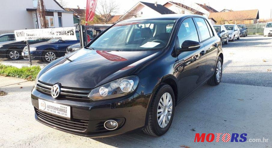 2011' Volkswagen Golf VI 1,6 Tdi photo #1