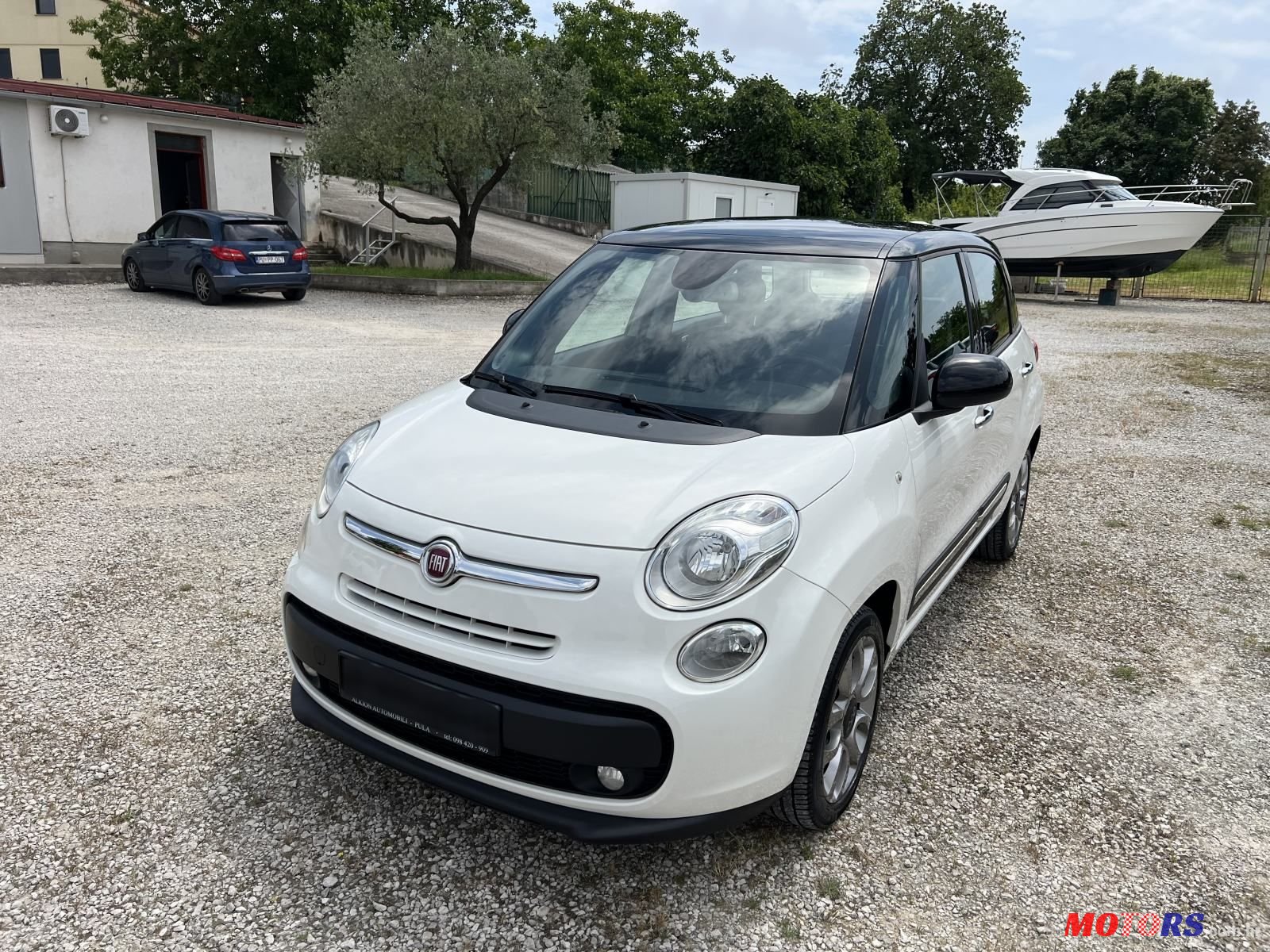 2014' Fiat 500L photo #1