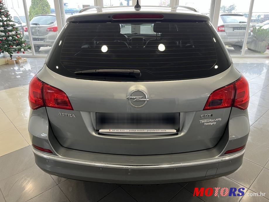 2015' Opel Astra Karavan photo #6