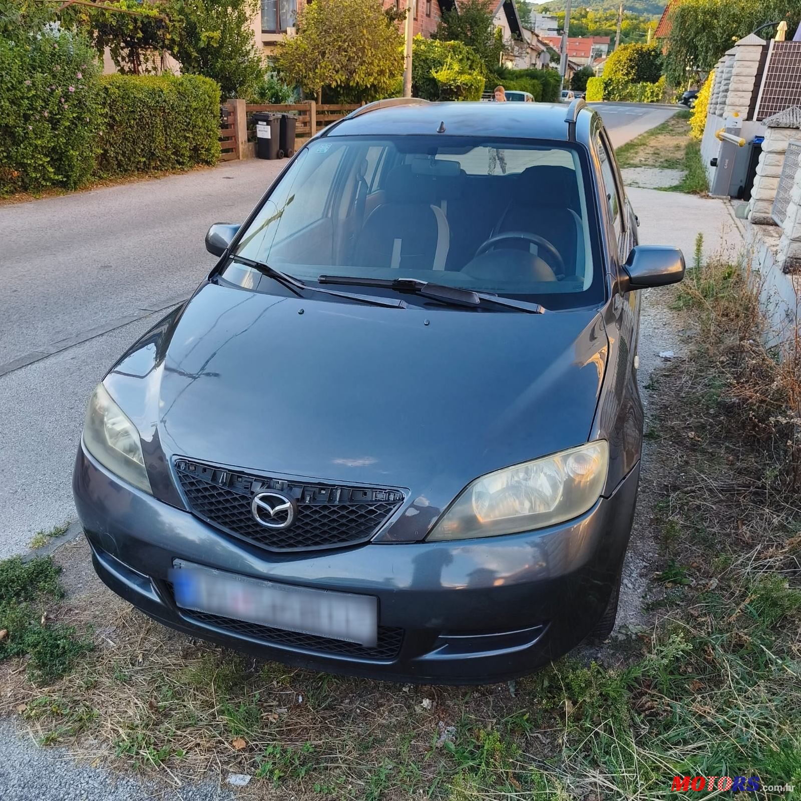 2004' Mazda 2 1,25 I photo #1