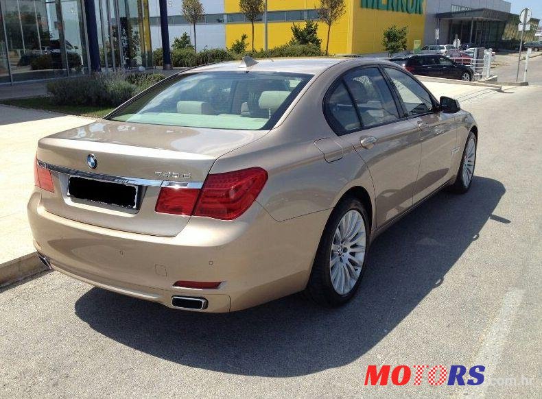 2011' BMW 7 Series 740D photo #1