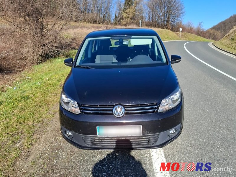 2014' Volkswagen Touran 1,6 Tdi photo #1
