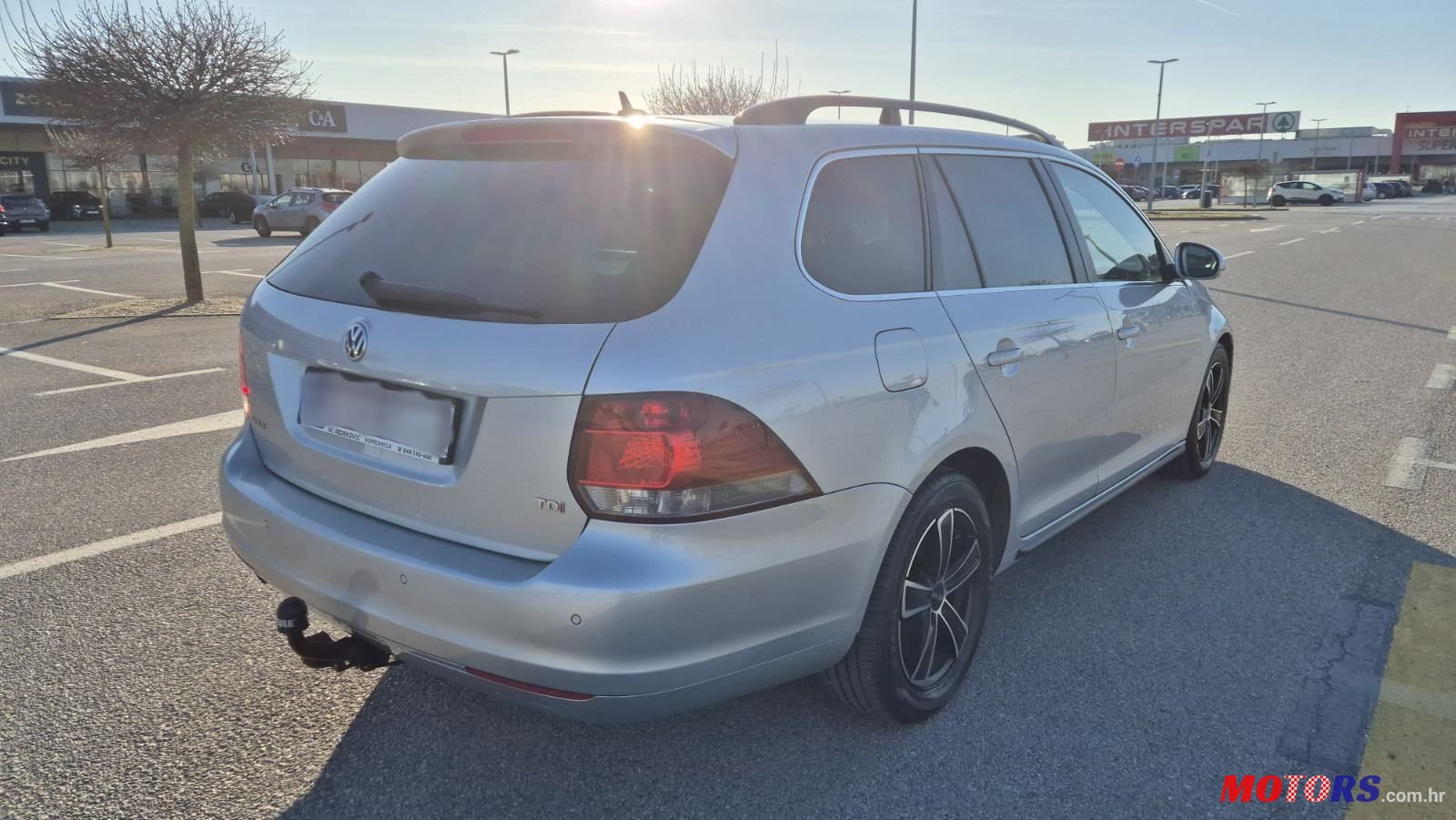 2011' Volkswagen Golf VI Variant photo #4