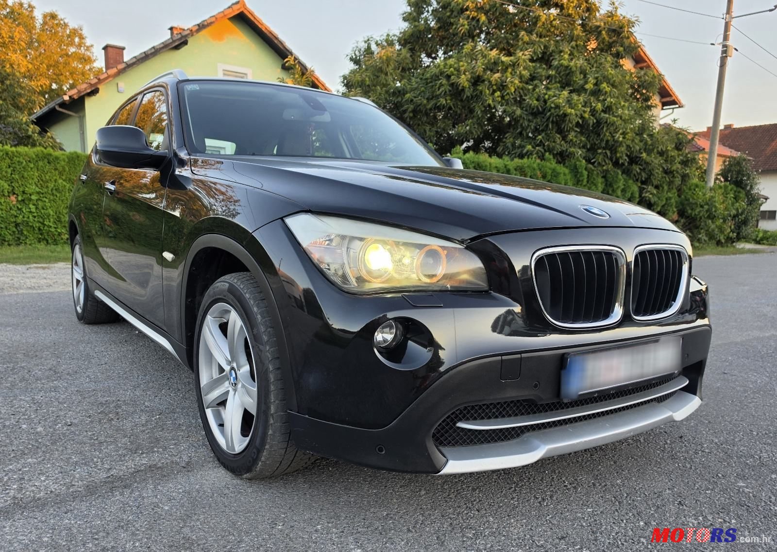 2011' BMW X1 Xdrive20D photo #1