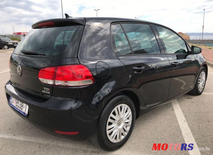 2011' Volkswagen Golf VI 1,6 Tdi photo #1