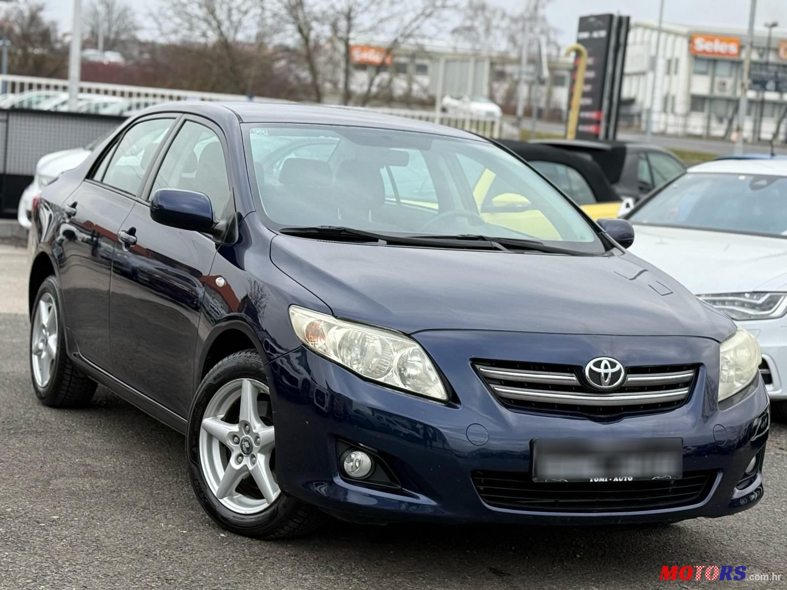 2009' Toyota Corolla Sedan photo #1