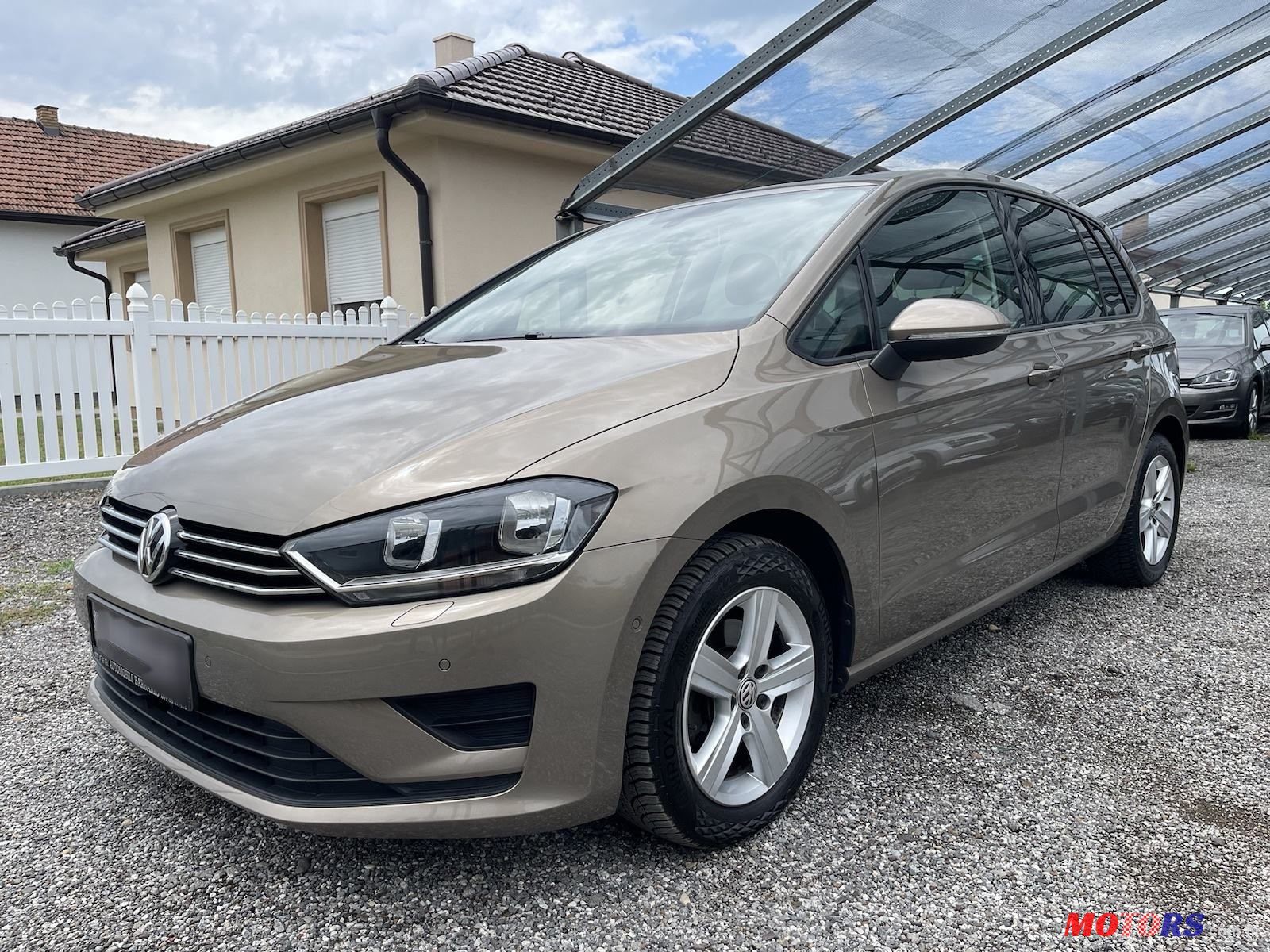 2014' Volkswagen Golf Sportsvan photo #1