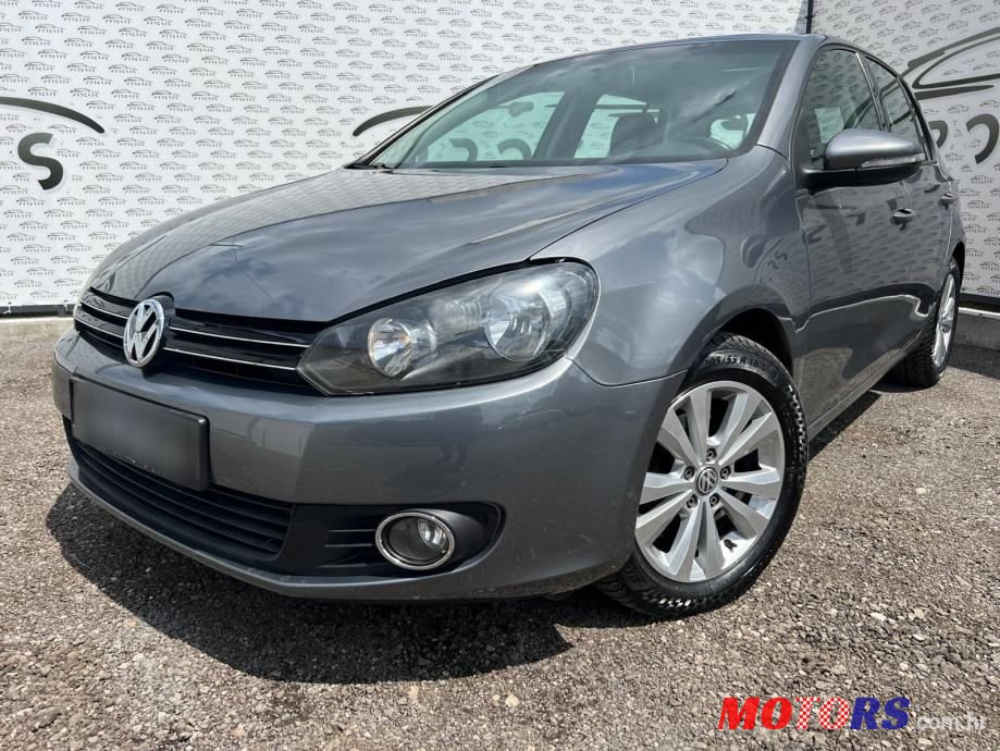 2010' Volkswagen Golf VI 1,6 Tdi photo #1