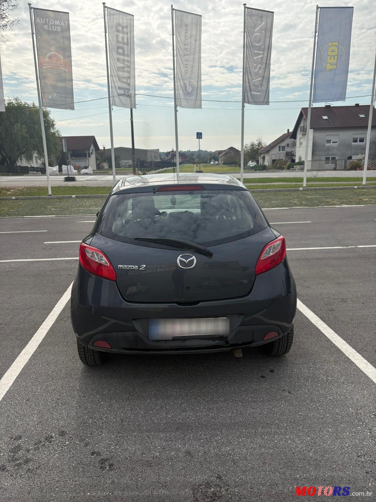 2008' Mazda 2 photo #4