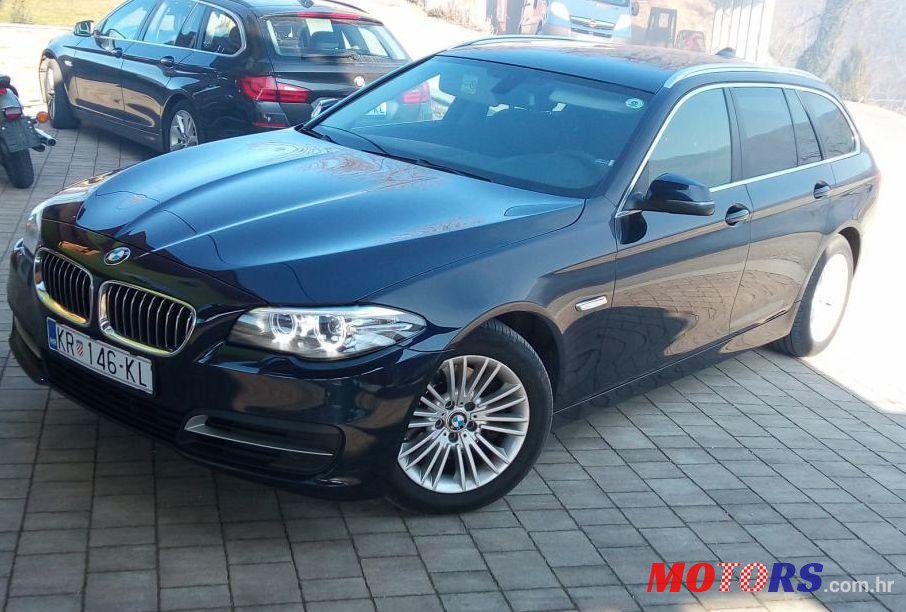 2015' BMW Serija 5 Touring 520D photo #1