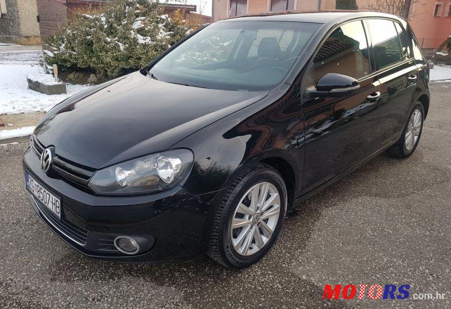 2012' Volkswagen Golf VI 1,6 Tdi photo #1